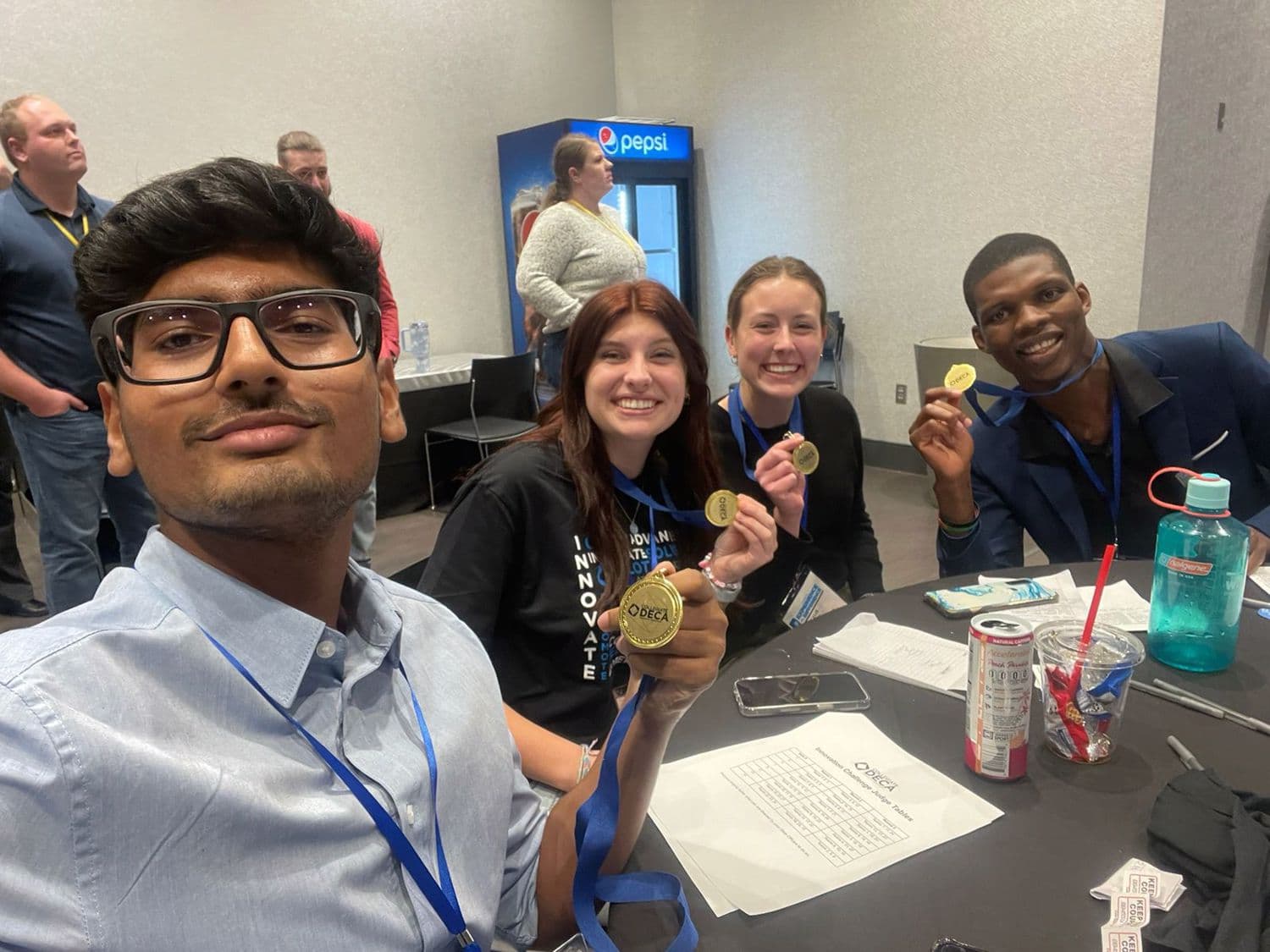 SMSU DECA members celebrating with DECA medals