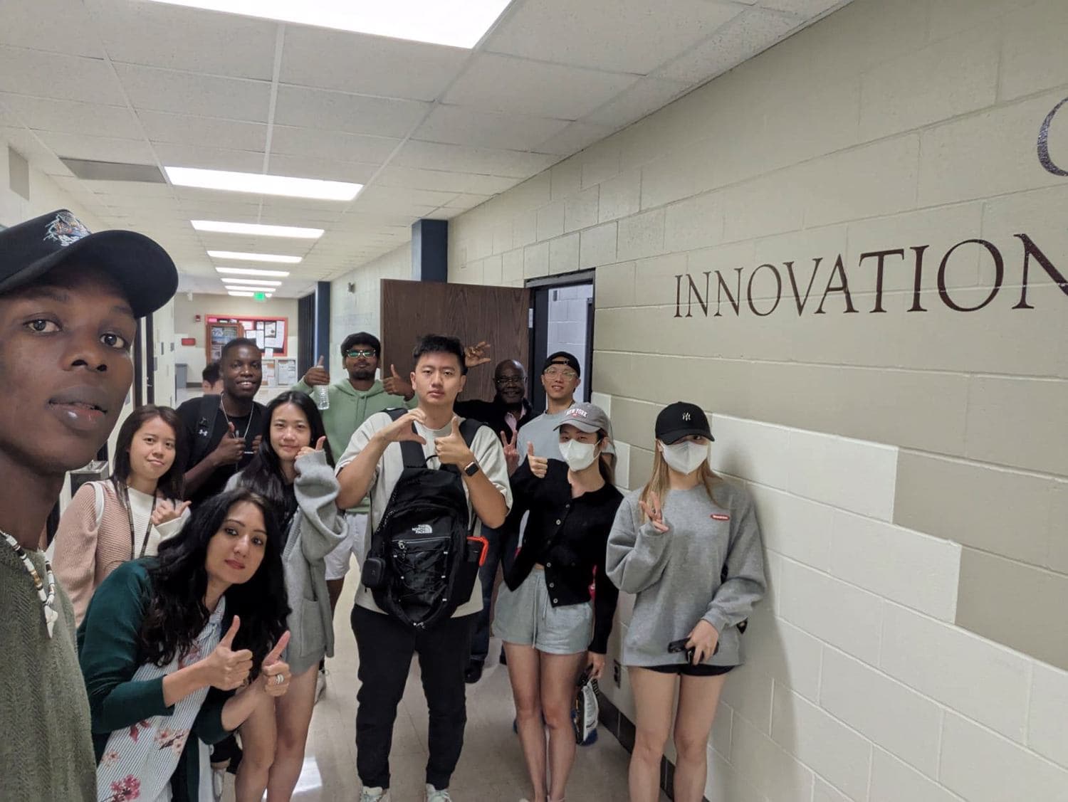 SMSU DECA students gathered in the INNOVATION hallway on campus